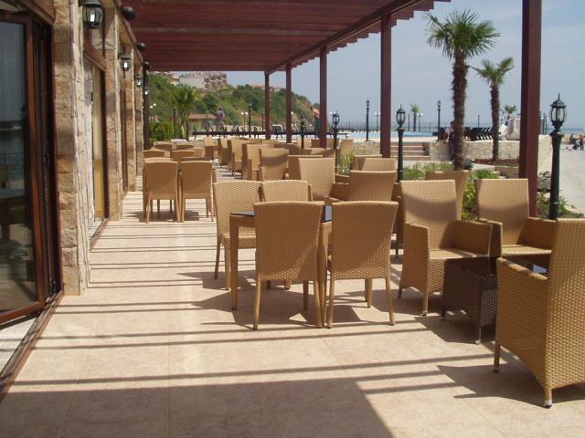 The seating area for the second cafe/restaurant - you can see the pool just beyond